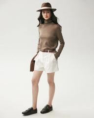 Rollkragenpullover aus 100 % Merinowolle mit Knopfmanschetten