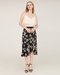 100% Seiden-Mittelrock mit Daisy-Druckmuster und asymmetrischer Saumlinie