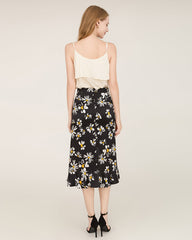 100% Seiden-Mittelrock mit Daisy-Druckmuster und asymmetrischer Saumlinie