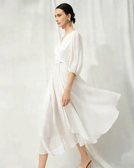 V-Ausschnitt Seiden-Midikleid mit Twist-Detail an der Taille