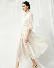 V-Ausschnitt Seiden-Midikleid mit Twist-Detail an der Taille