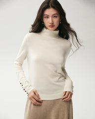 Rollkragenpullover aus 100 % Merinowolle mit Knopfmanschetten