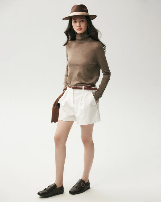 Rollkragenpullover aus 100 % Merinowolle mit Knopfmanschetten