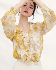 Gelbe Seiden-Bluse mit Blumenmuster und Rüschen